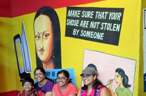 Okay, creepy Indian Mona Lisa, we'll watch our shoes... Akhil, Suma, Achala and I at lunch