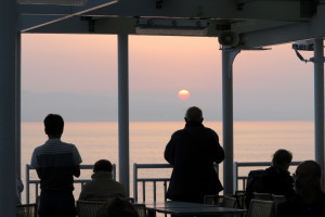 Sunrise from ferry to Santorini