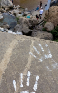 Hands by river, Chefchaouen, Morocco 
