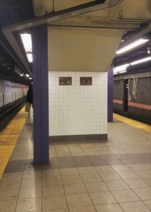The Walls Have Eyes Mosaic in Manhattan Subway Station NYC, USA; November 2019.