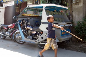 2015.11.19 boy-and-Tricycles-El-Nido-Palawan-Philippines   
